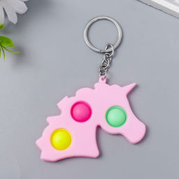 Цена за 12 шт. Брелок резина антистресс (бесконечная пупырка) Розовый единорог МИКС 9х5,6 см