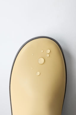 BOTA DE AGUA COLOR BLOCK / Marr?n Arena