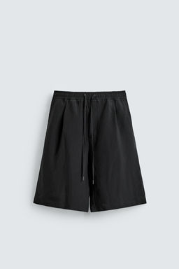 BERMUDA FLUIDA JACQUARD RAYAS / Negro - Zara фото 7