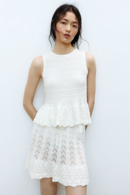 Top en punto pointelle con peplum - H&m фото 8