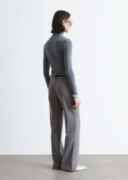 Pantalones acampanados con pliegues marcados - H&m фото 4