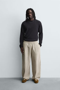 BALLOON FIT PLEATED TROUSERS