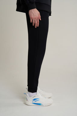 Брюки трикотажные Черный TRN ESSENTIAL Knit Track Pants