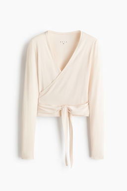 Top de deporte cruzado en modal - H&m фото 11