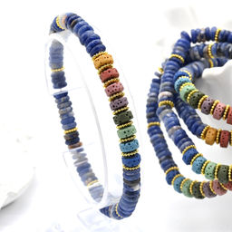 Браслет из содалита диски 6*2мм со вставками из лавы, 16см