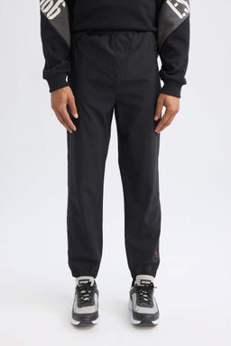 DeFactoFit NBA Chicago Bulls Спортивные спортивные штаны с эластичной резинкой и карманами для бега узкого кроя  фото 5