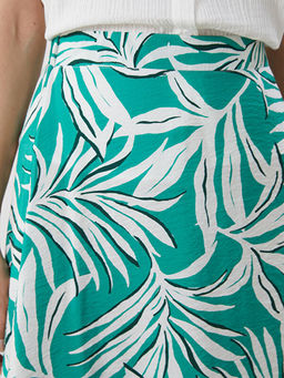 Beli Lastikli ?i?ekli A Kesim Etek