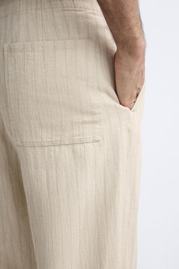 STRIPED TEXTURED TROUSERS - Zara фото 6