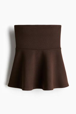 Top de tubo con peplum
