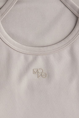 Top de deporte SoftMove con sujetador integrado - H&m фото 9