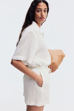 Pantalon corto en muselina