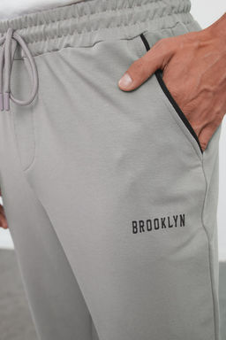TRENDYOL MAN Lacivert Regular Fit Bask?l? Biyeli Lastik Paca Esofman Alt? TMNSS22EA0121 - Trendyolmilla фото 4