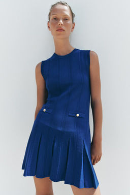 KNIT DRESS WITH BOX PLEATS