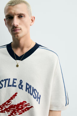 CAMISETA PUNTO RETRO BANDAS / Blanco roto