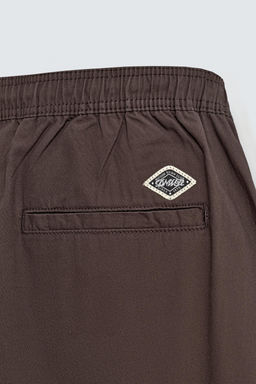 BALLOON FIT PLEATED TROUSERS