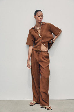 WIDE-LEG TROUSERS WITH ELASTIC WAISTBAND - Zara фото 20