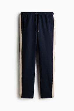 Pantal?n de ch?ndal con DryMove Regular Fit