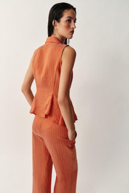 CHALECO RAYAS PEPLUM / Caldero