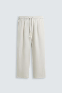 RELAXED FIT FLOWING TROUSERS - Zara фото 6