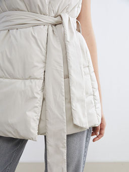 Kap??onlu Beli Ku?akl? Kad?n ?i?me Yelek