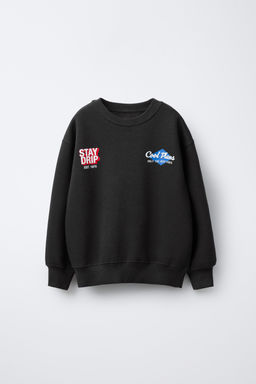 RAISED SLOGAN SWEATSHIRT