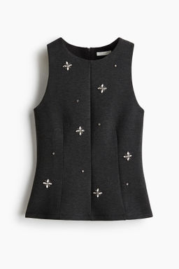 Top efecto neopreno con detalles decorativos