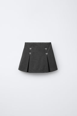 SHINY BERMUDA SKIRT WITH BOWS