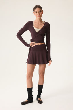 Top de deporte cruzado en modal - H&m фото 16