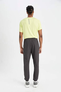 DeFactoFit Тканые спортивные штаны для бега стандартного кроя с двойными карманами  фото 7