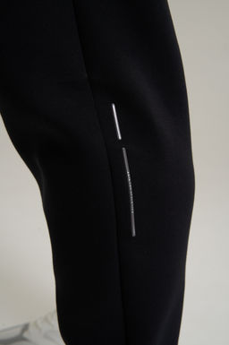 Брюки трикотажные Черный ANTA TRN Knit Track Pants фото 7