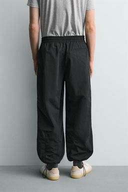 PANTAL?N JOGGER T?CNICO BANDAS CONTRASTE / Negro - Zara фото 13