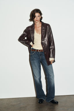 TRF SLUNG LOW-RISE STUDDED JEANS