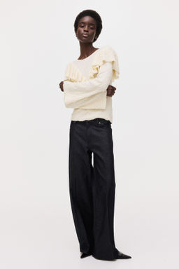 Top en punto texturizado con volantes - H&m фото 4