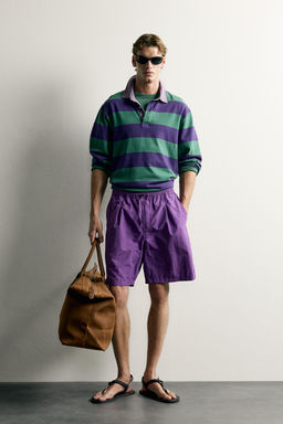 PANTALONES CORTOS T?CNICOS 9 / Morado