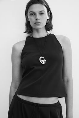 Top sin mangas en punto roma - H&m фото 5