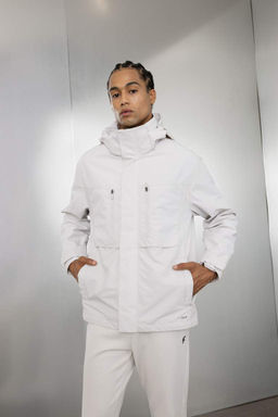 Водоотталкивающее водонепроницаемое пальто с капюшоном стандартной посадки DeFactoFit  фото 3