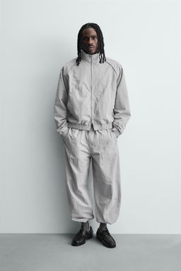 PANTAL?N JOGGER T?CNICO BANDAS CONTRASTE / Gris claro