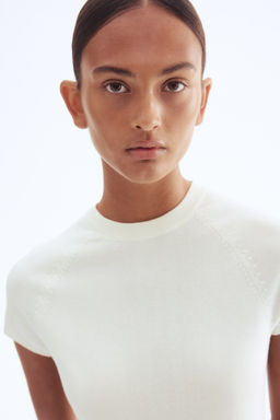 Top en punto fino con peplum - H&m фото 5
