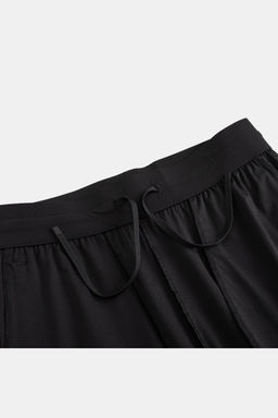 Брюки трикотажные Черный PANTS BAR Knit Track Pants - Anta фото 3