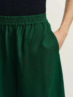 Льняные шорты свободного кроя / Zarina фото 6