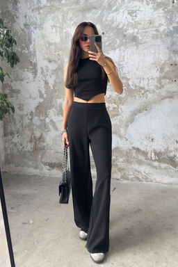 TRENDYOLMILLA Siyah Onu Duz Arkas? Lastikli Straight/Duz Kesim Yuksek Bel Orme Pantolon TWOSS25PL00053