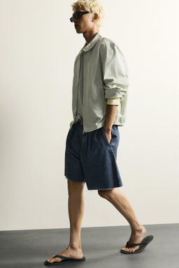 BERMUDA RELAXED FIT LAVADO IRREGULAR / Azul - Zara фото 6