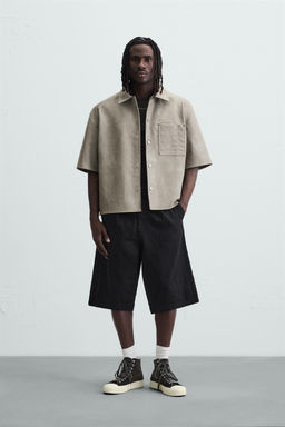 LEATHER EFFECT OVERSHIRT
