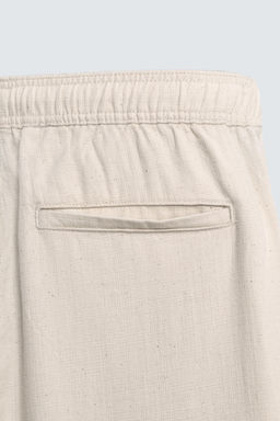 TEXTURED RELAXED FIT TROUSERS - Zara фото 20