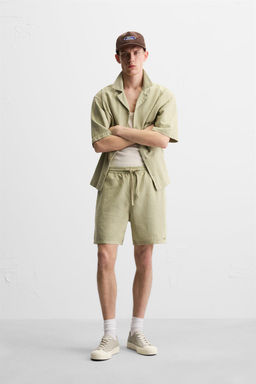 EMBROIDERED TEXTURED BERMUDA SHORTS