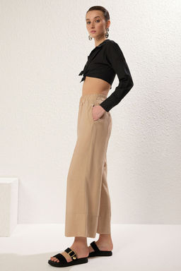 TRENDYOLMILLA Vizon Modal Cep Detayl? Wide Leg/Genis Paca Pileli Dokuma Pantolon TWOSS25PL00081  фото 3