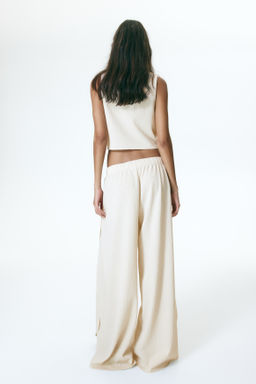Top efecto arrugado con detalle cruzado - H&m фото 4