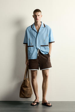 CAMISA RELAXED FIT BORDADO NADADORES / Celeste