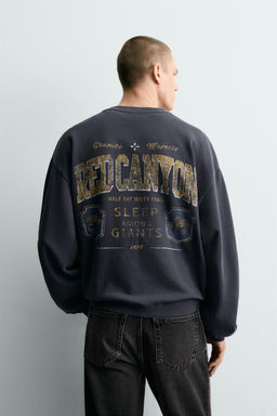 WASHED SWEATSHIRT WITH SLOGAN PRINT
