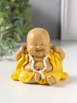 Фигурка полистоун «Маленький хотей в жёлтом одеянии - не слышу», 7.5×9.5×8.3 см